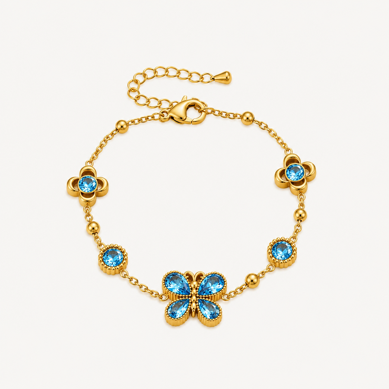 Bracelet papillon et fleur en zircons colorés, plaqué or