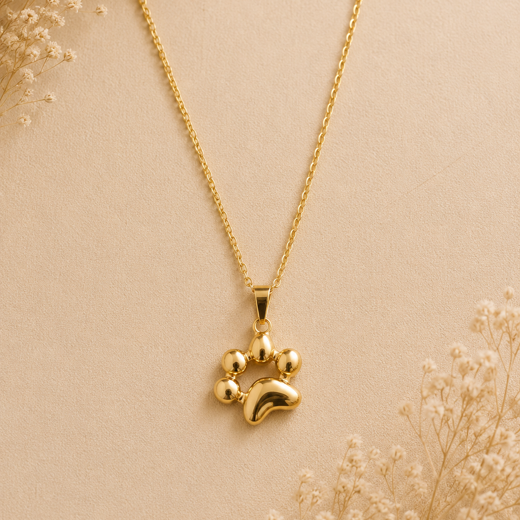 Collier pendentif empreinte de patte plaqué or 18K, poli miroir ajouré