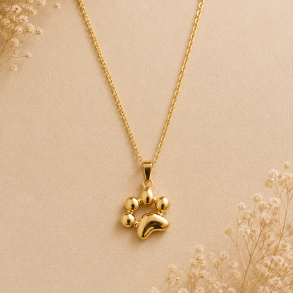 Collier pendentif empreinte de patte plaqué or 18K, poli miroir ajouré