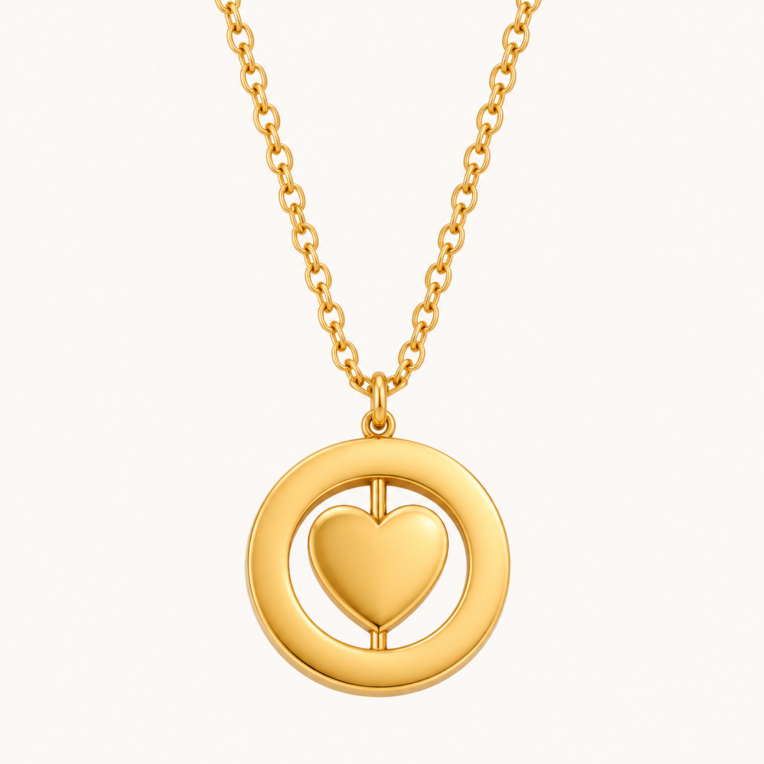 Collier pendentif cœur rotatif plaqué or 18K dans un double anneau géométrique